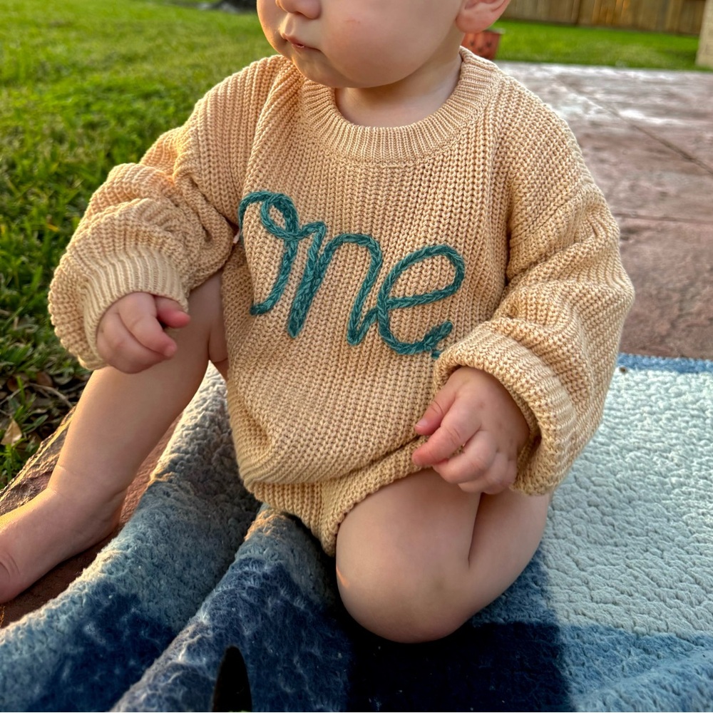 Amazon Beige Knit Sweater with Teal 'one' Embroidery